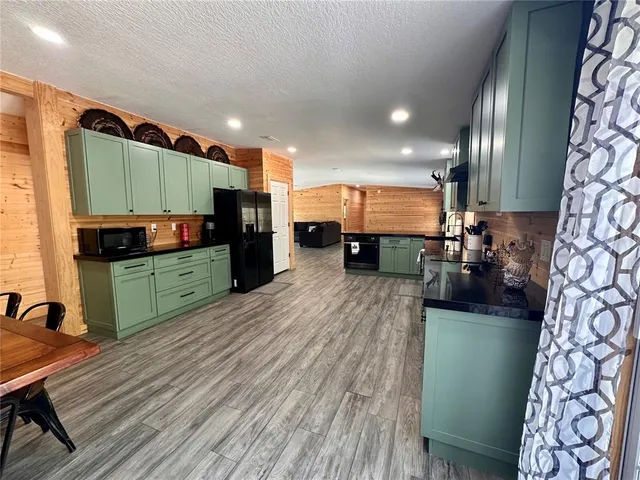 a workspace with furniture and wooden floor