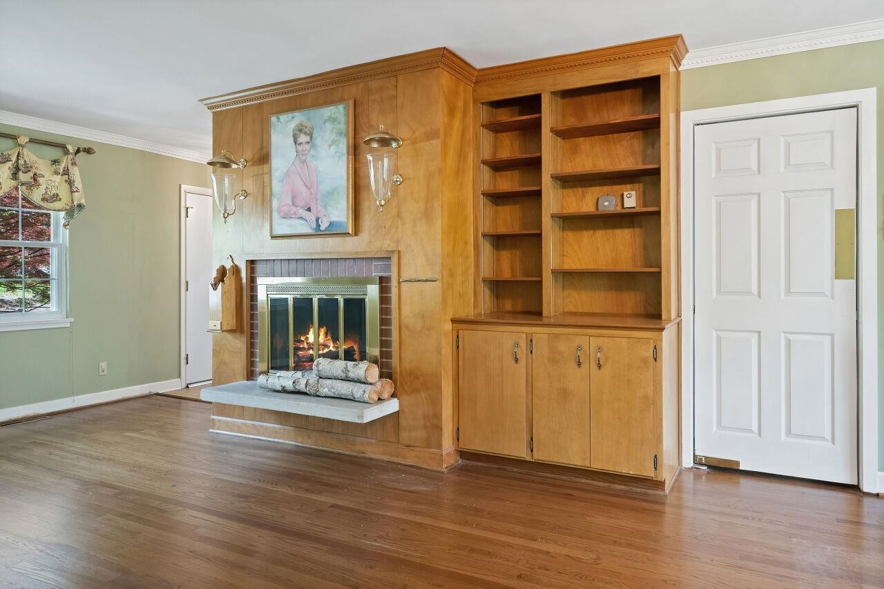 100 East Drewry Lane Raleigh, NC 27609 - Photo 13 of 18 Swinging Door Into Kitchen
