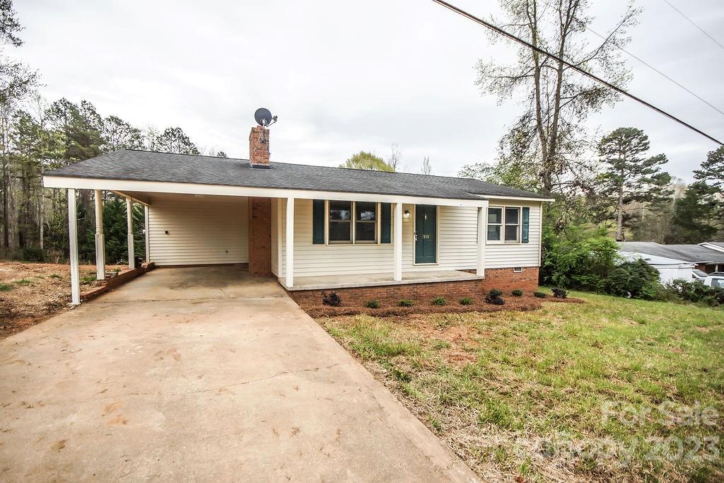 8998 Mt Olive Road Mount Pleasant, NC 28124 - Photo 2 of 15 a house view with a backyard space