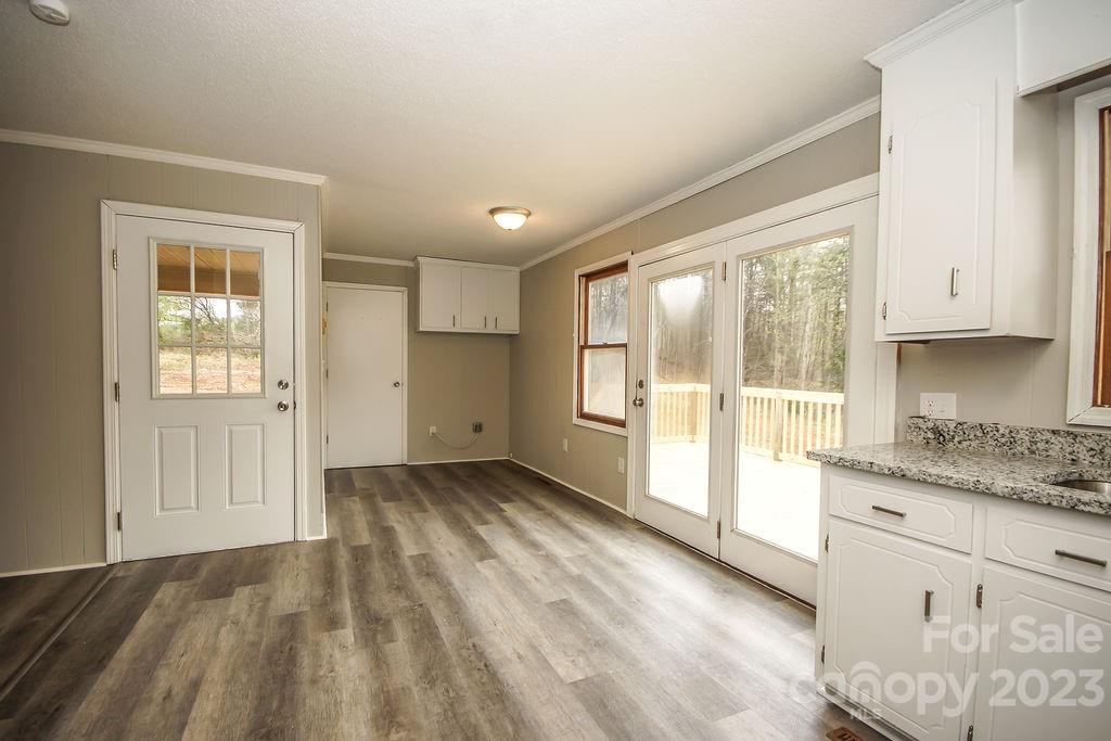 8998 Mt Olive Road Mount Pleasant, NC 28124 - Photo 5 of 15 a view of a kitchen with a sink and cabinets
