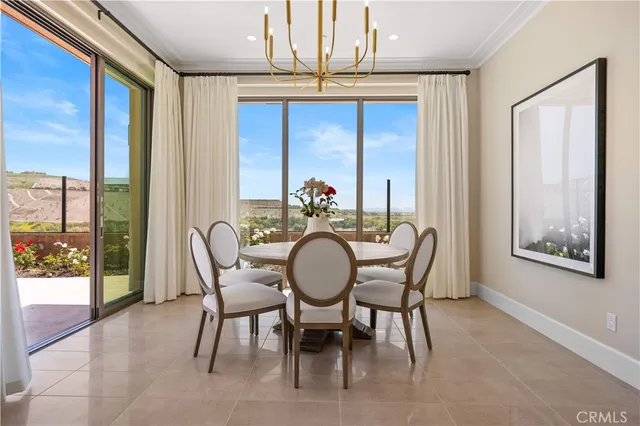 a living room with furniture a window and a couch