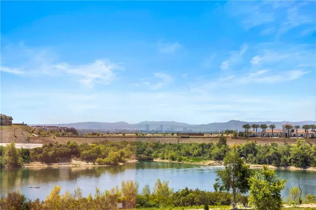 front view of a brick house with a yard