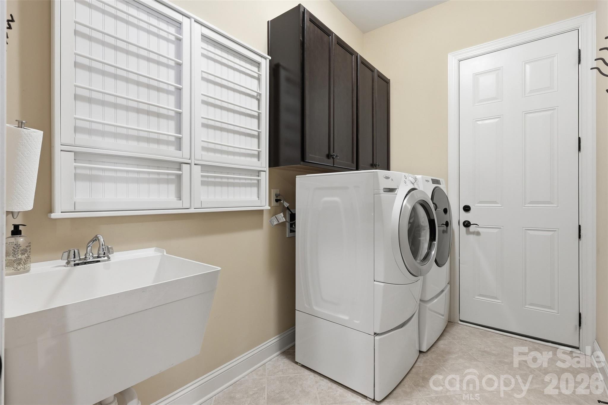 8094 Clems Branch Road Indian Land, SC 29707 - Photo 16 of 38 a utility room with dryer and washer