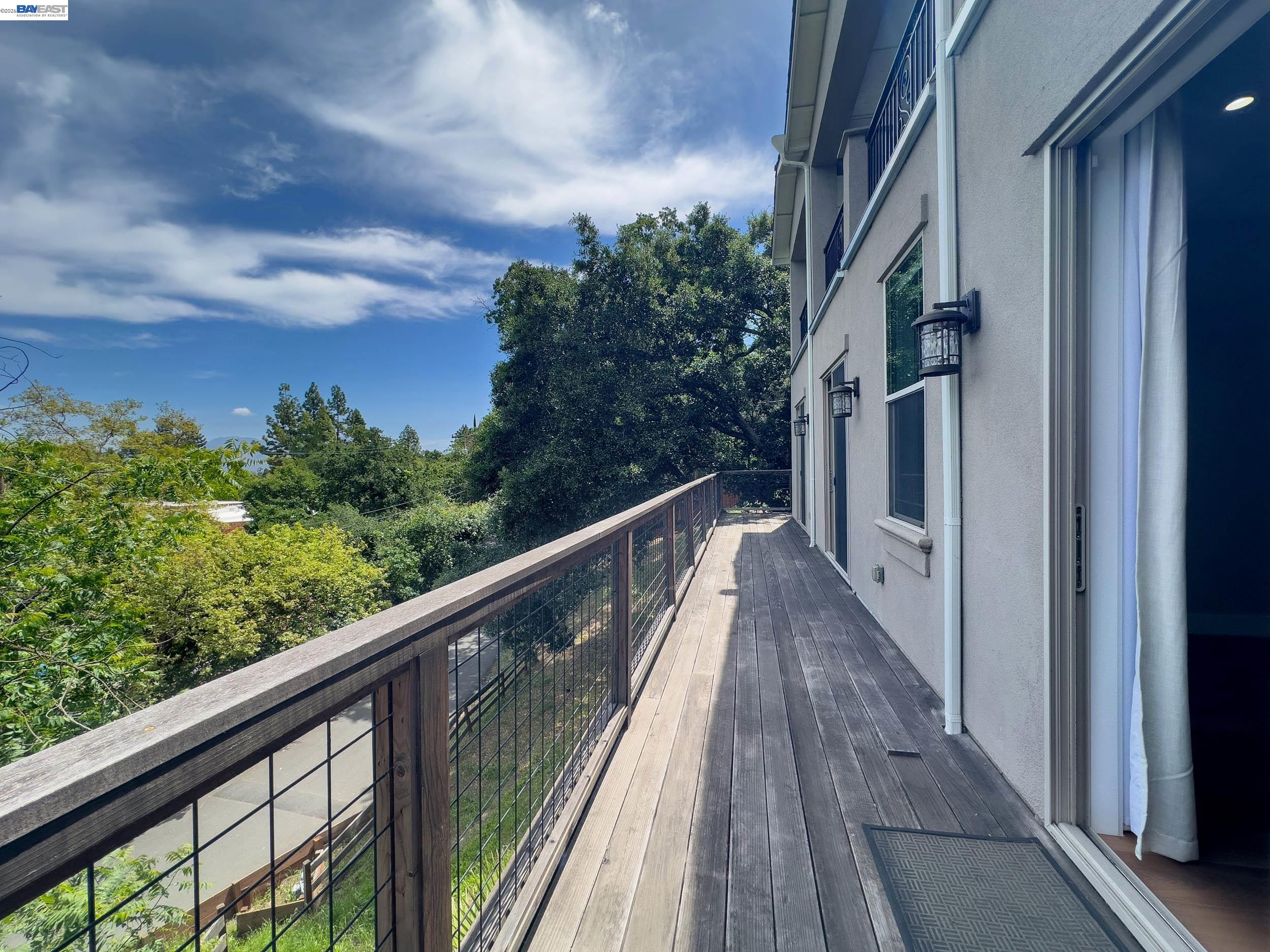 1516 Pleasant Hill Road Lafayette, CA 94549 - Photo 19 of 38 a view of balcony with wooden floor and fence