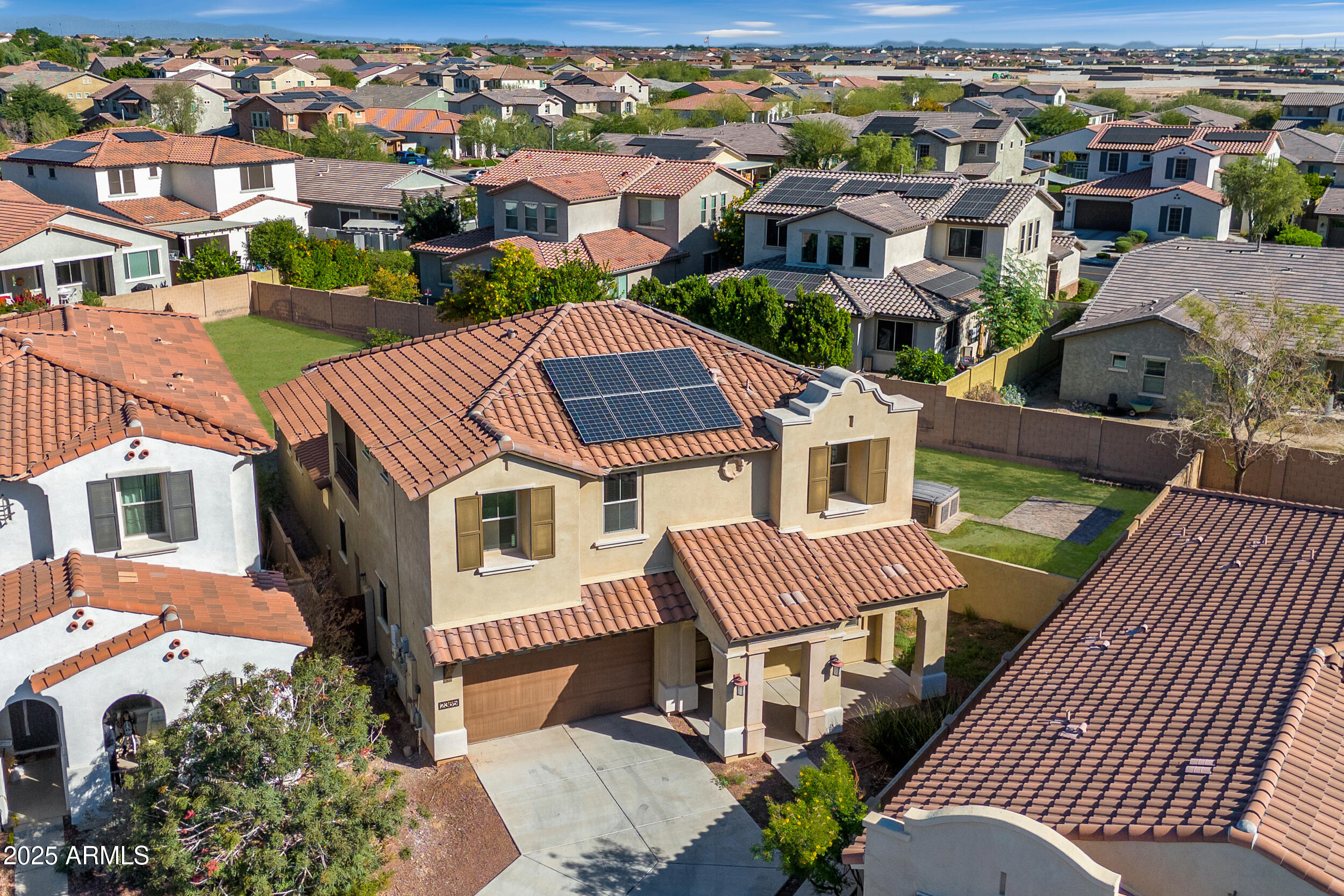 2365 North Springfield Street Buckeye, AZ 85396 - Photo 1 of 30 an aerial view of a house with a yard