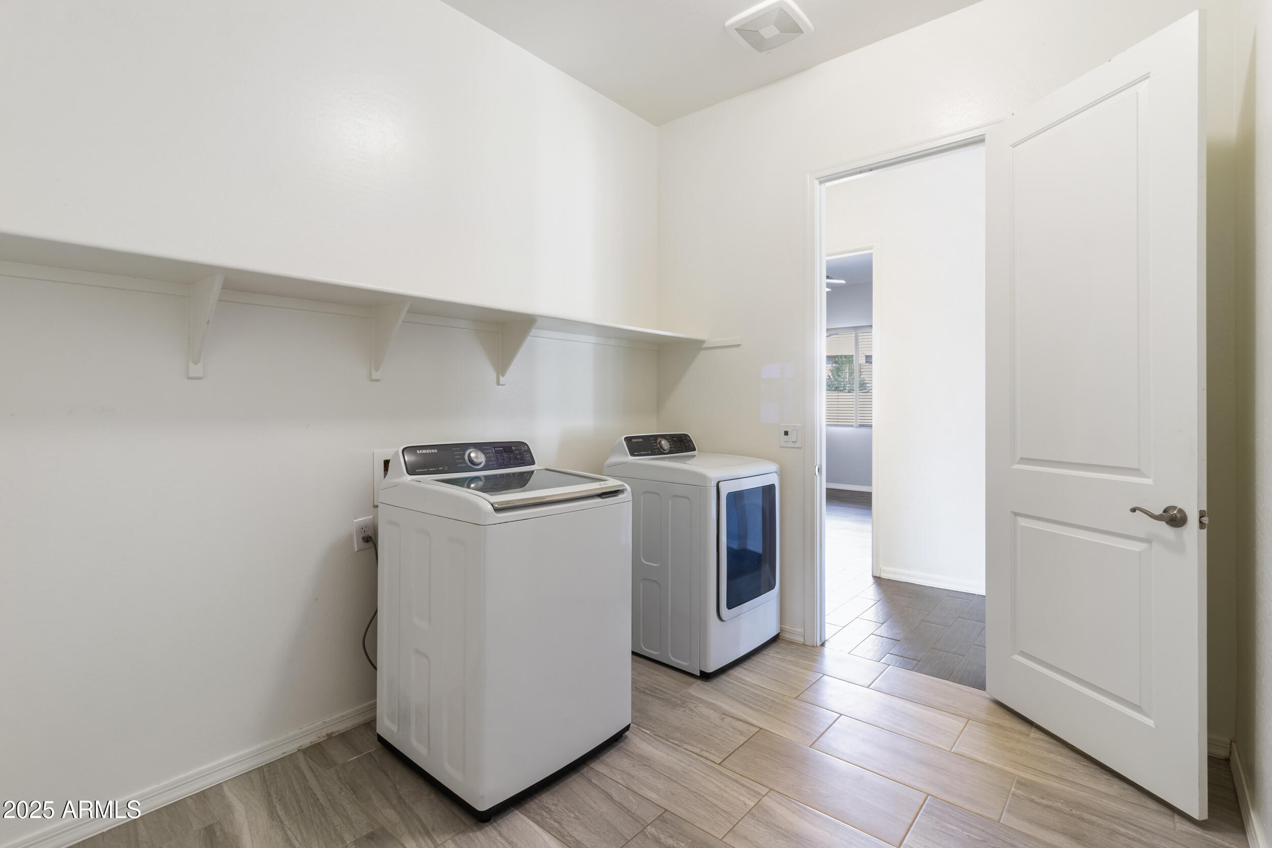 2365 North Springfield Street Buckeye, AZ 85396 - Photo 16 of 30 a utility room with washer and dryer