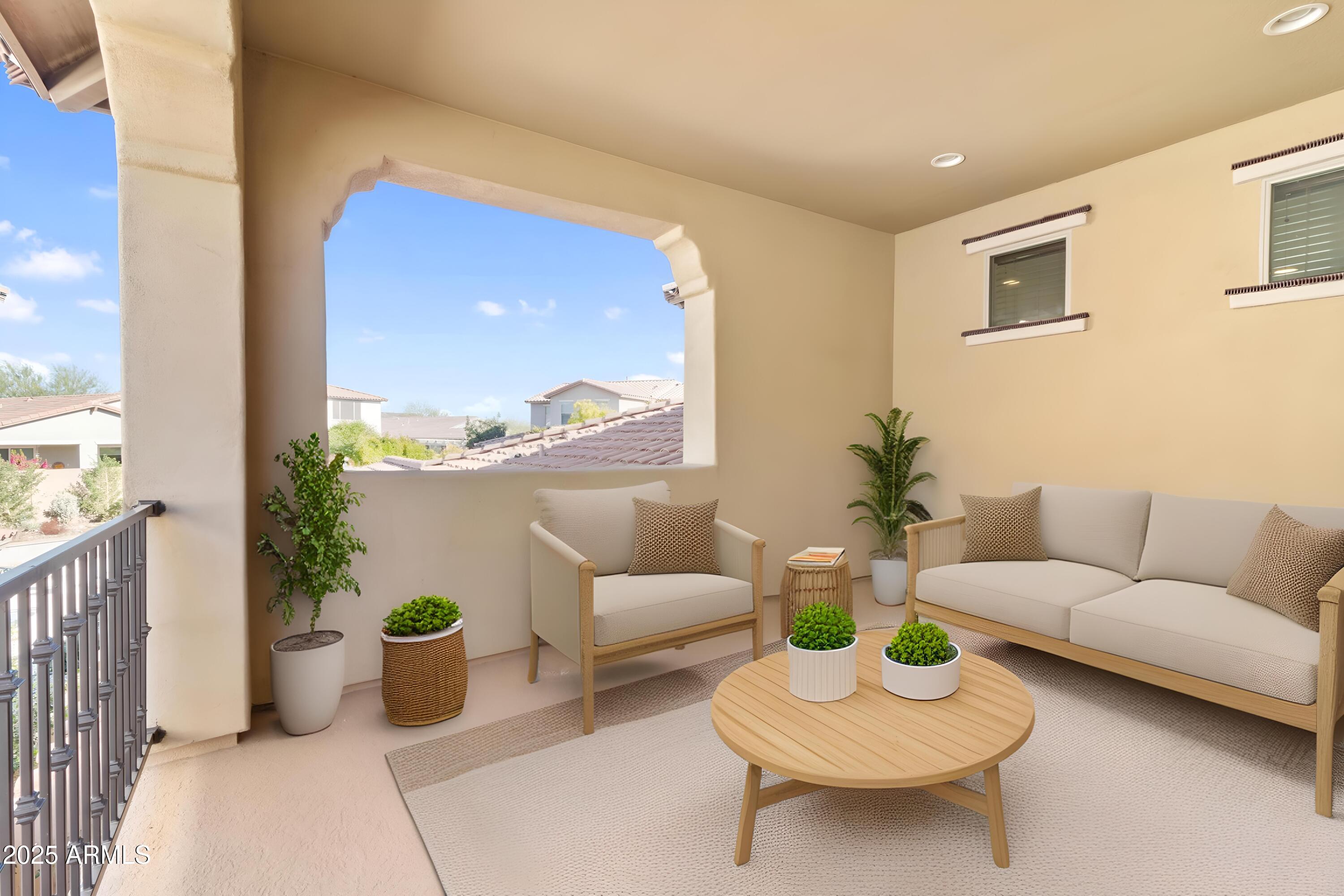 2365 North Springfield Street Buckeye, AZ 85396 - Photo 23 of 30 a living room with furniture and a potted plant