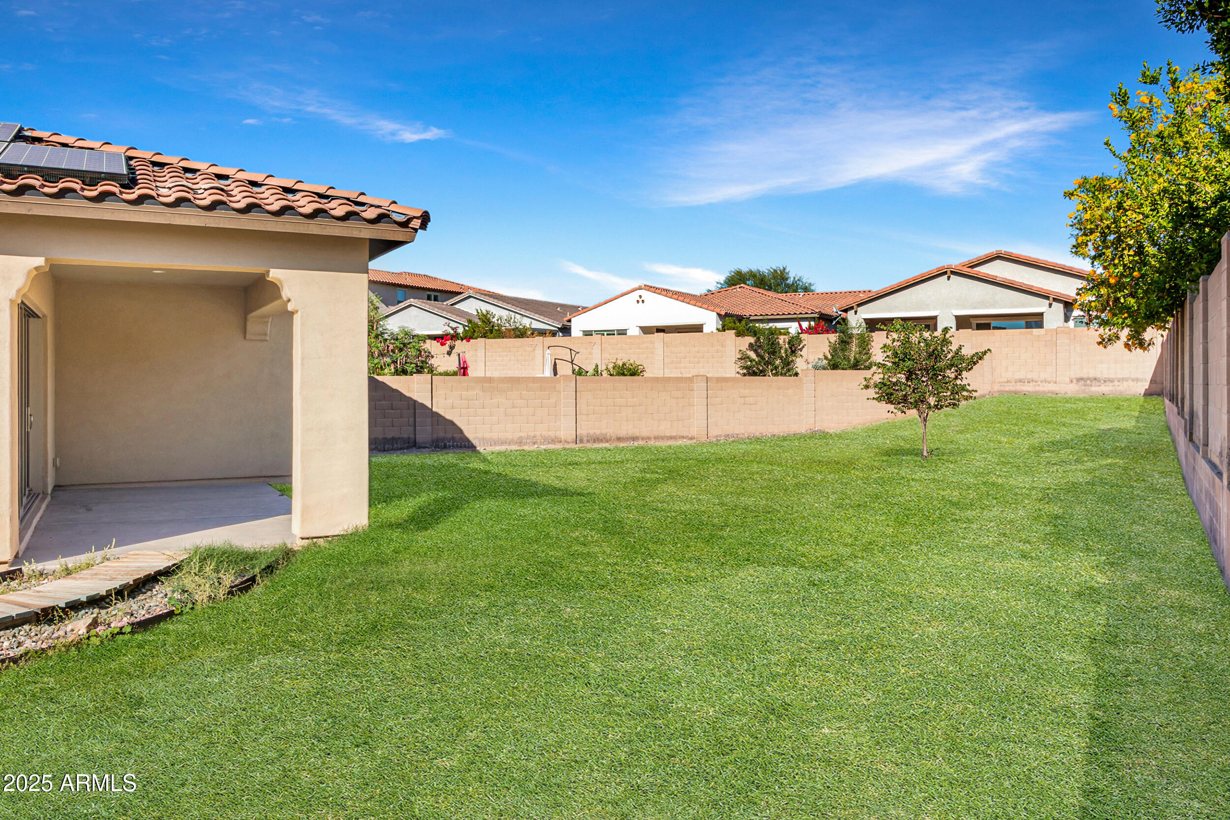 2365 North Springfield Street Buckeye, AZ 85396 - Photo 24 of 30 a view of a house with a yard