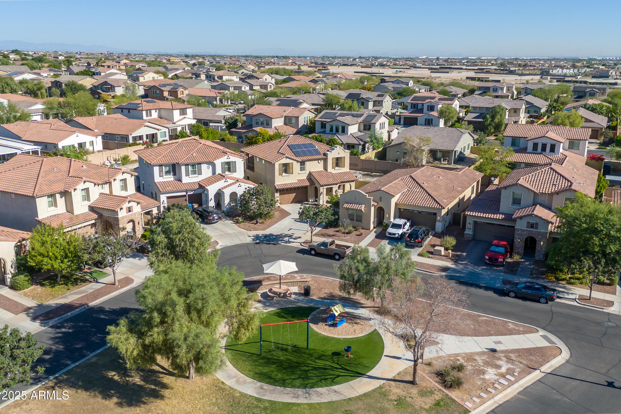 2365 North Springfield Street Buckeye, AZ 85396 - Photo 29 of 30 an aerial view of a house with a yard basket ball court and outdoor seating