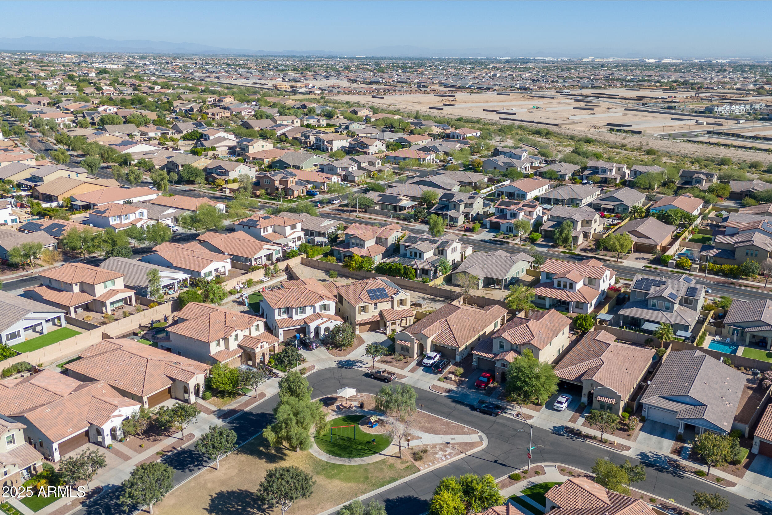 2365 North Springfield Street Buckeye, AZ 85396 - Photo 30 of 30 an aerial view of residential houses with outdoor space