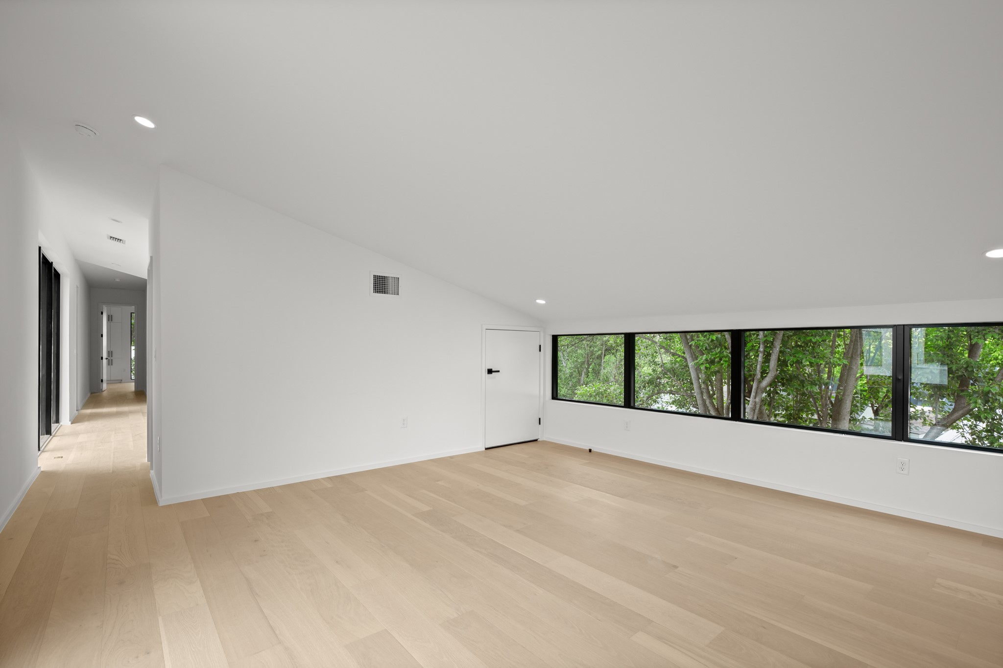 2215 South 3rd Street Austin, TX 78704 - Photo 26 of 38 a view of an empty room with a window