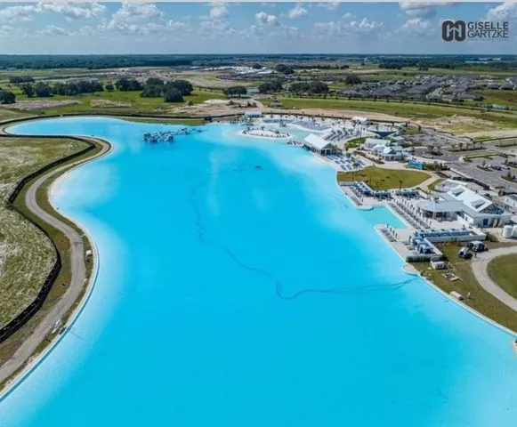 a view of a swimming pool and an outdoor space