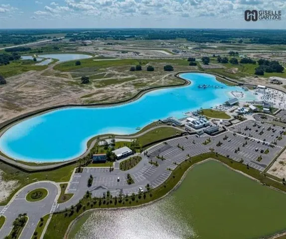 a view of a swimming pool with a chair
