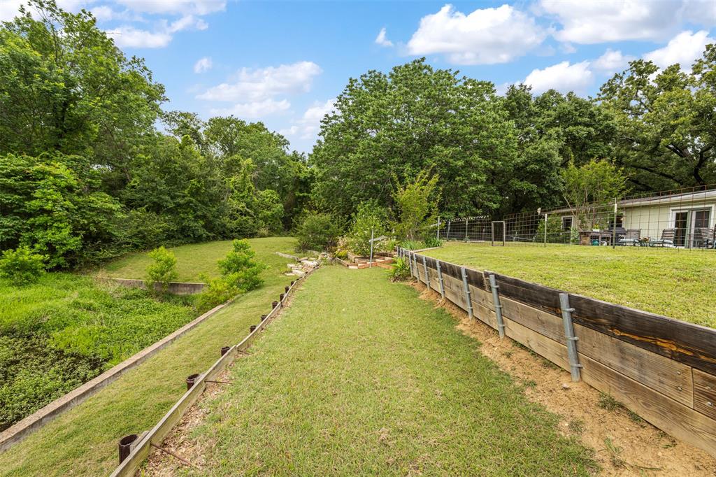713 Midway Road Tool, TX 75143 - Photo 25 of 28 a view of an outdoor space and swimming pool