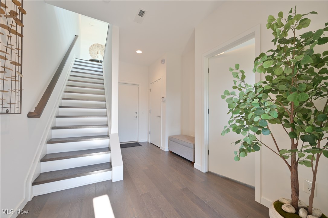 18875 Riversouth Terrace, Unit 35 Cleveland, OH 44126 - Photo 4 of 37 Staircase with wood finished floors and recessed lighting