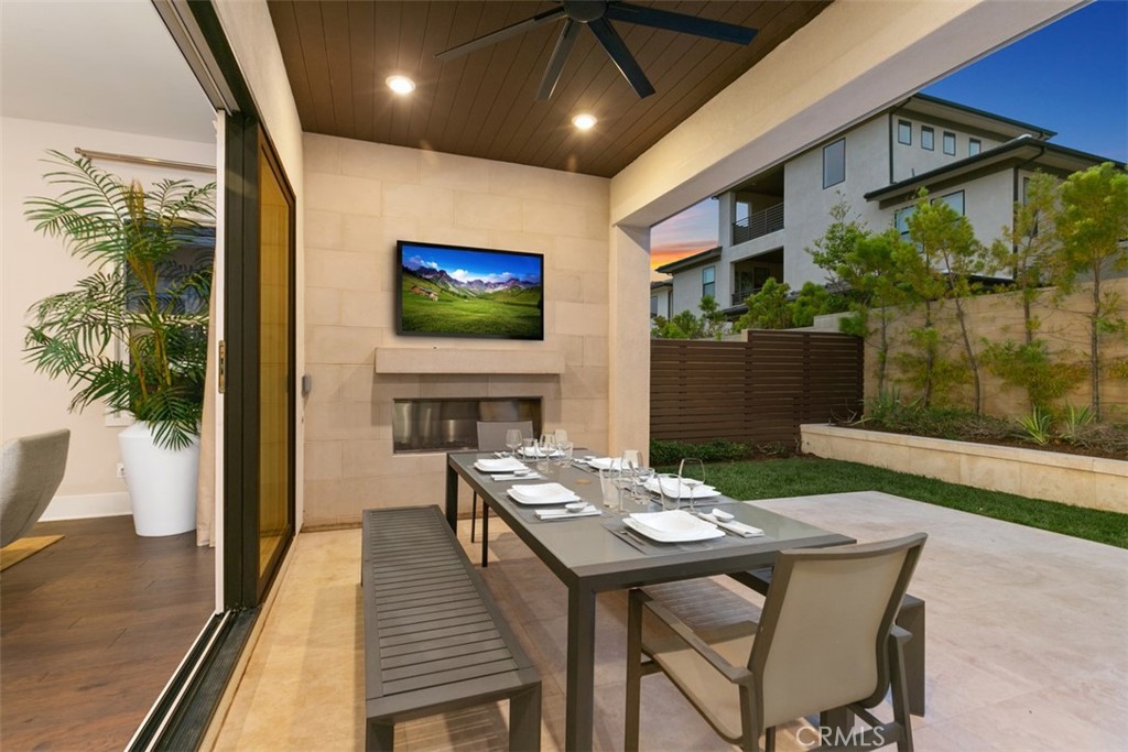 79 Gravity Irvine, CA 92618 - Photo 22 of 70 a view of a dining room with furniture window and wooden floor