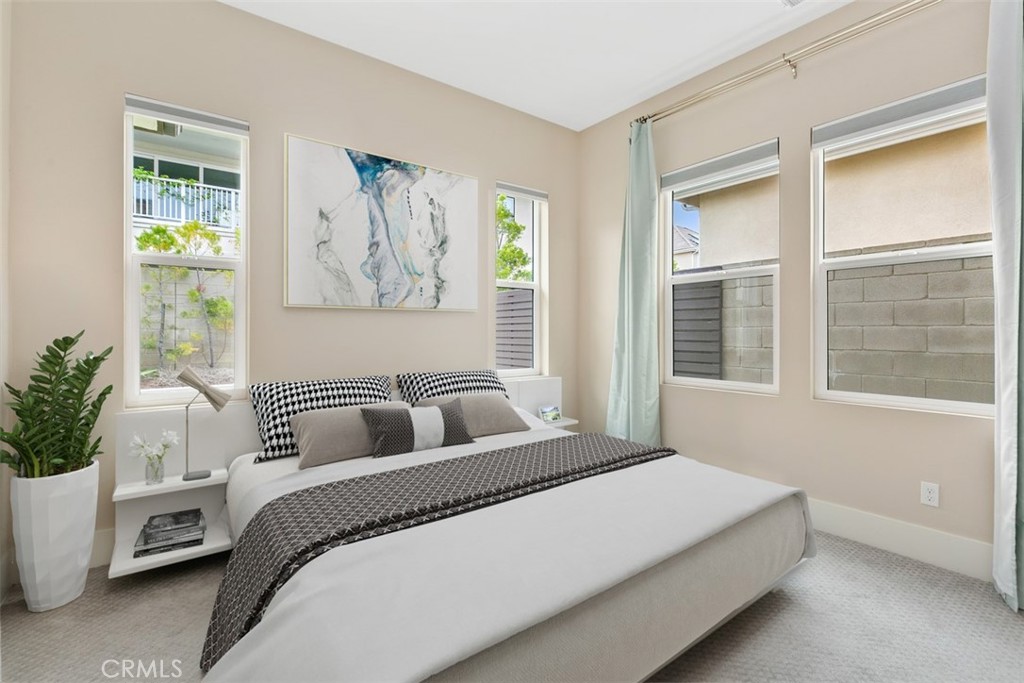 79 Gravity Irvine, CA 92618 - Photo 29 of 70 a bedroom with a bed and a large window