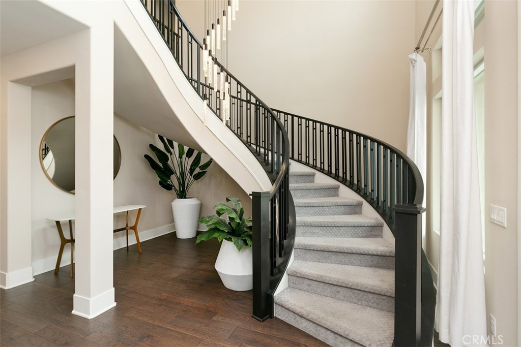79 Gravity Irvine, CA 92618 - Photo 32 of 70 a view of entryway and hall with wooden floor