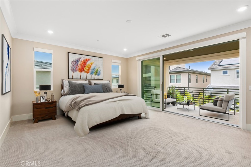 79 Gravity Irvine, CA 92618 - Photo 33 of 70 a spacious bedroom with a bed and a large window