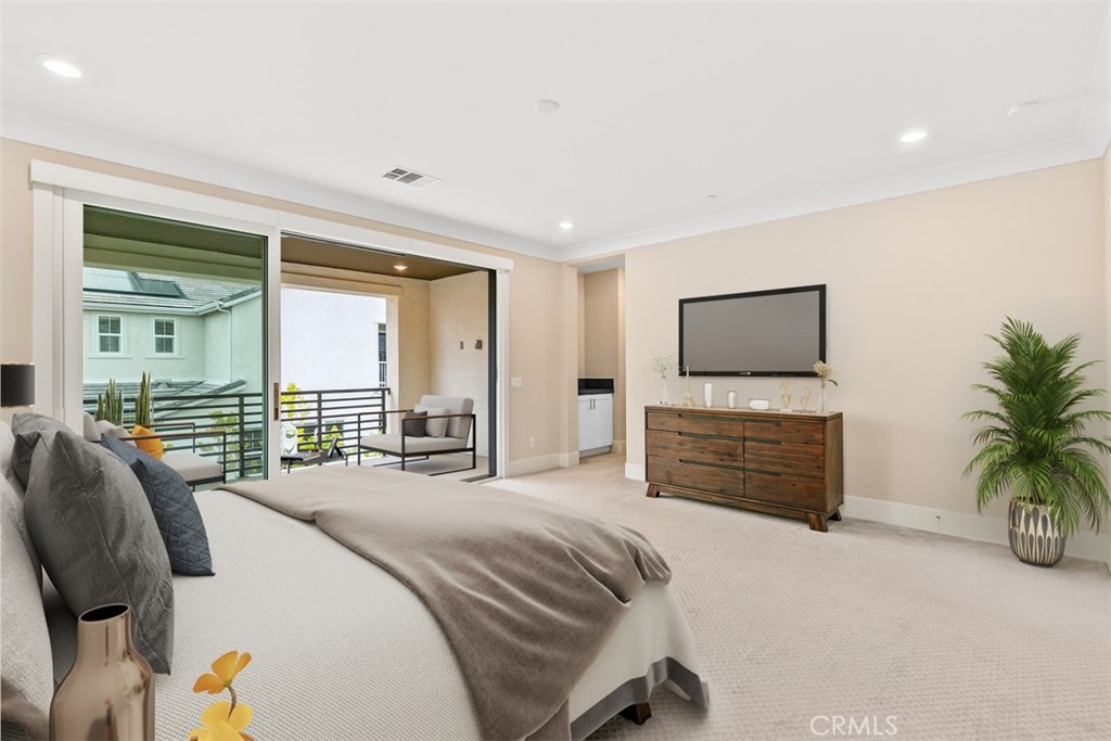 79 Gravity Irvine, CA 92618 - Photo 34 of 70 a bedroom with a bed and a flat screen tv