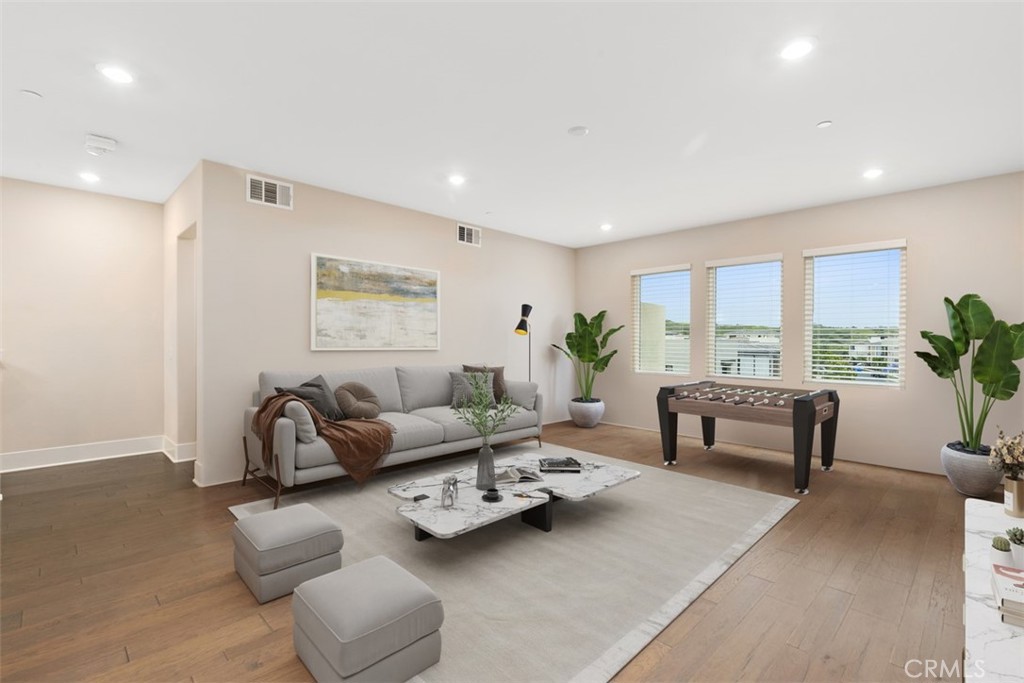 79 Gravity Irvine, CA 92618 - Photo 42 of 70 a living room with furniture and a large window