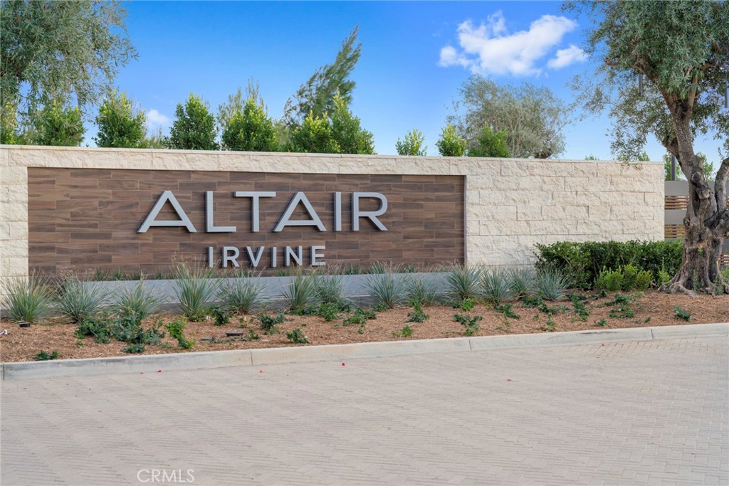 79 Gravity Irvine, CA 92618 - Photo 50 of 70 a view of outdoor space with signage and flags