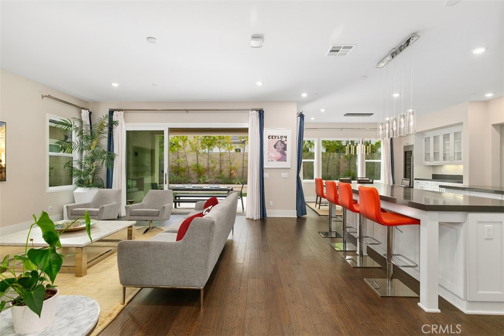 79 Gravity Irvine, CA 92618 - Photo 5 of 70 a living room with furniture and a large window