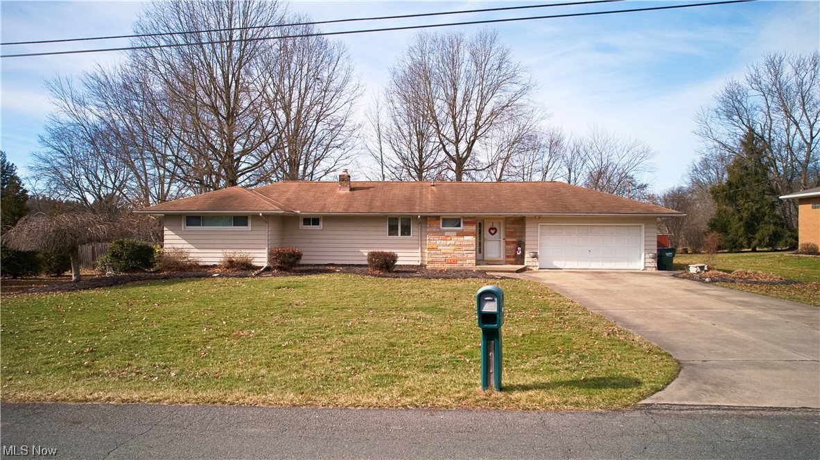 4061 Marks Rootstown, OH 44272 - Photo 3 of 25 Single story home with a front yard and a garage