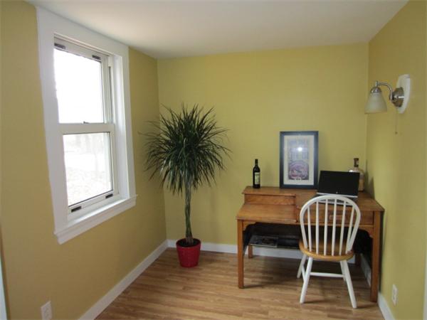 18 Hawthorne Road Wayland, MA 01778 - Photo 20 of 20 a balcony with table and chairs