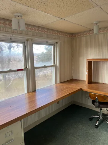 a bathroom with a toilet and a sink