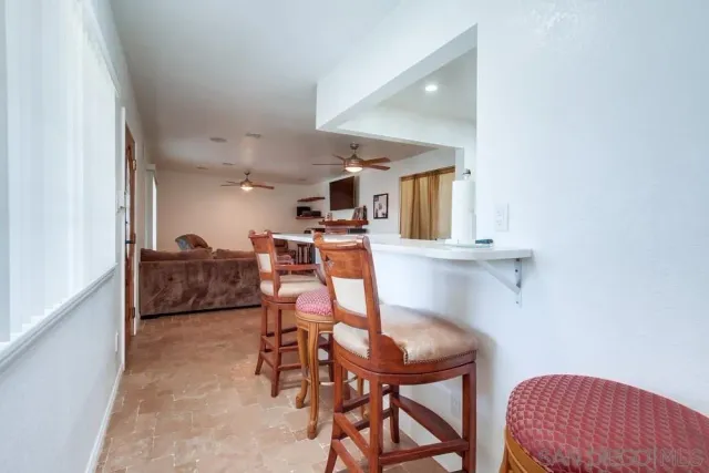 a workspace with furniture and a window