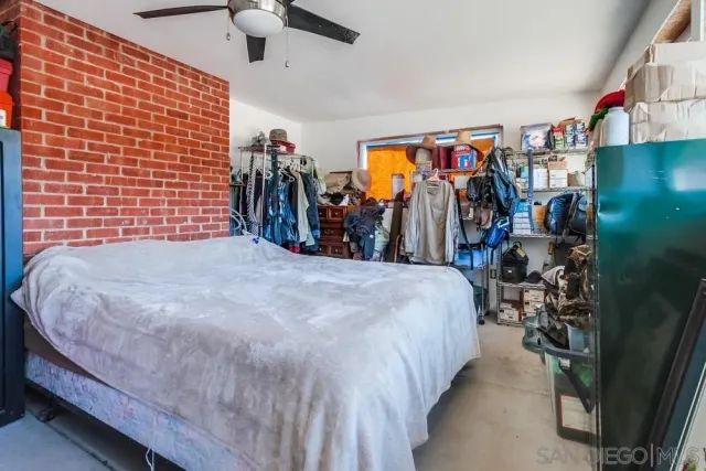 a bed room with a bed and a walk in closet