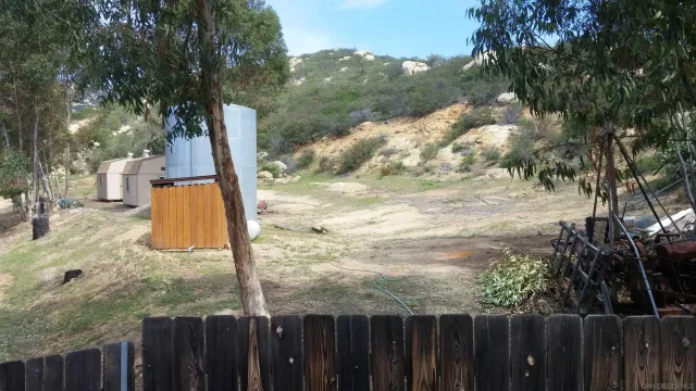 a kitchen with a refrigerator stove and microwave
