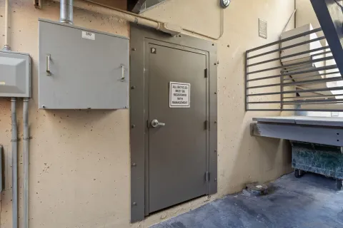 a view of balcony with wooden floor and plants