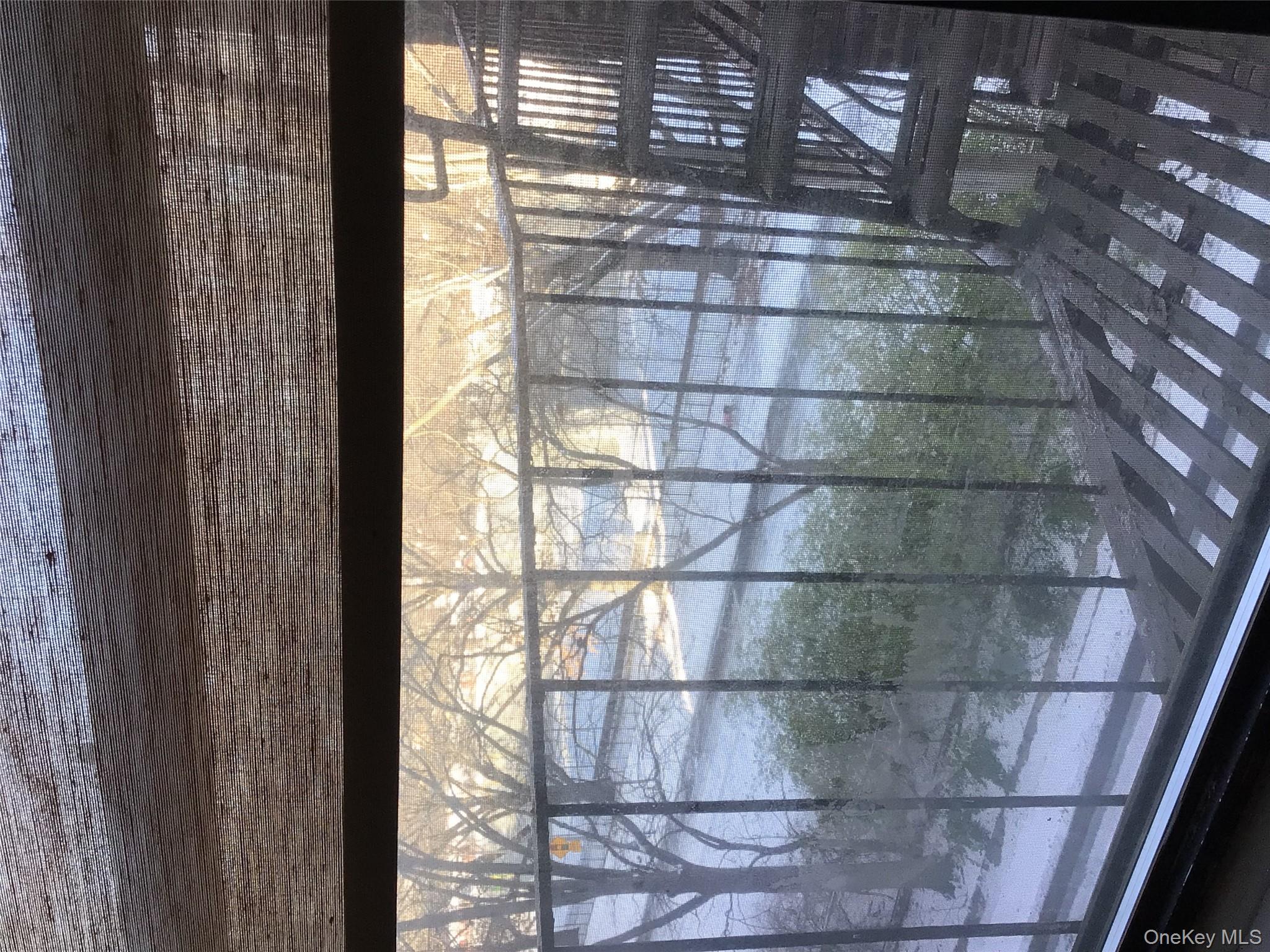 83-05 98th Street, Unit 5B Queens, NY 11421 - Photo 8 of 12 a view of outdoor space with swimming pool