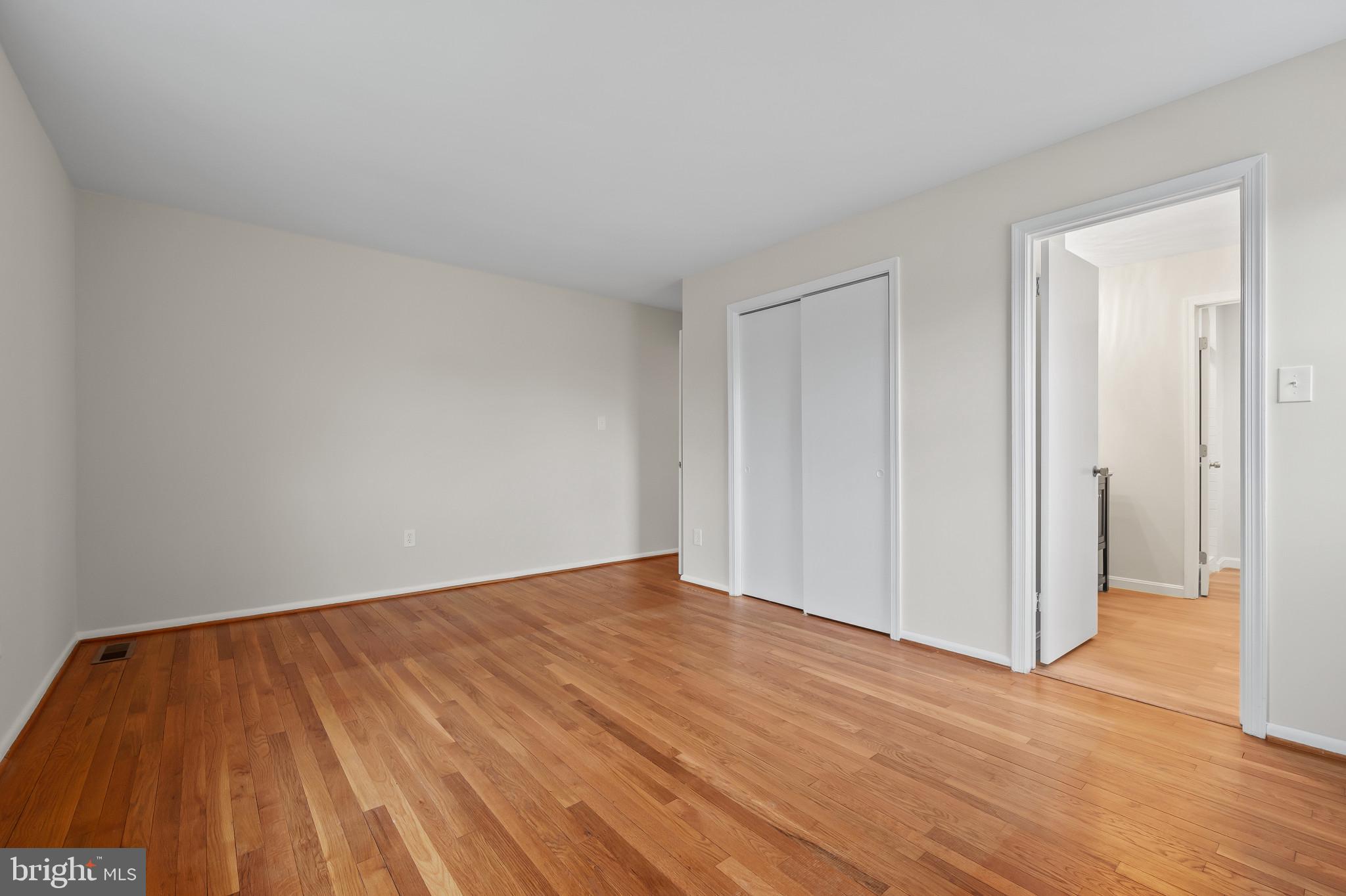 19420 Olney Mill Road Olney, MD 20832 - Photo 20 of 44 a view of empty room with wooden floor