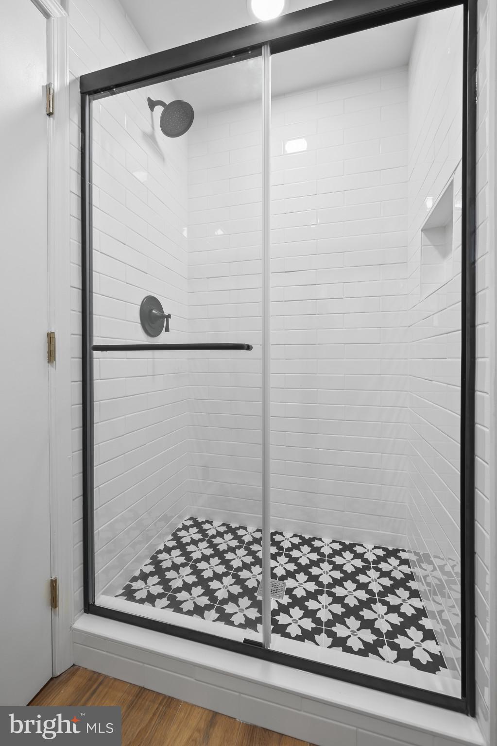 19420 Olney Mill Road Olney, MD 20832 - Photo 22 of 44 a bathroom with a shower and a sink