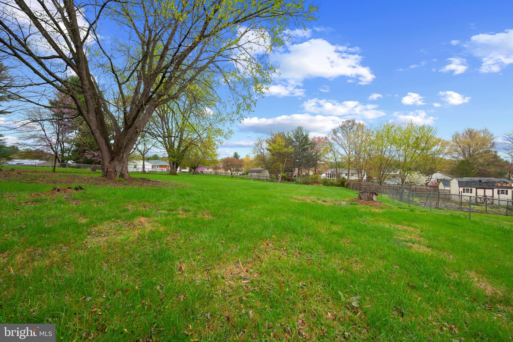 19420 Olney Mill Road Olney, MD 20832 - Photo 38 of 44 a backyard of a house with lots of green space
