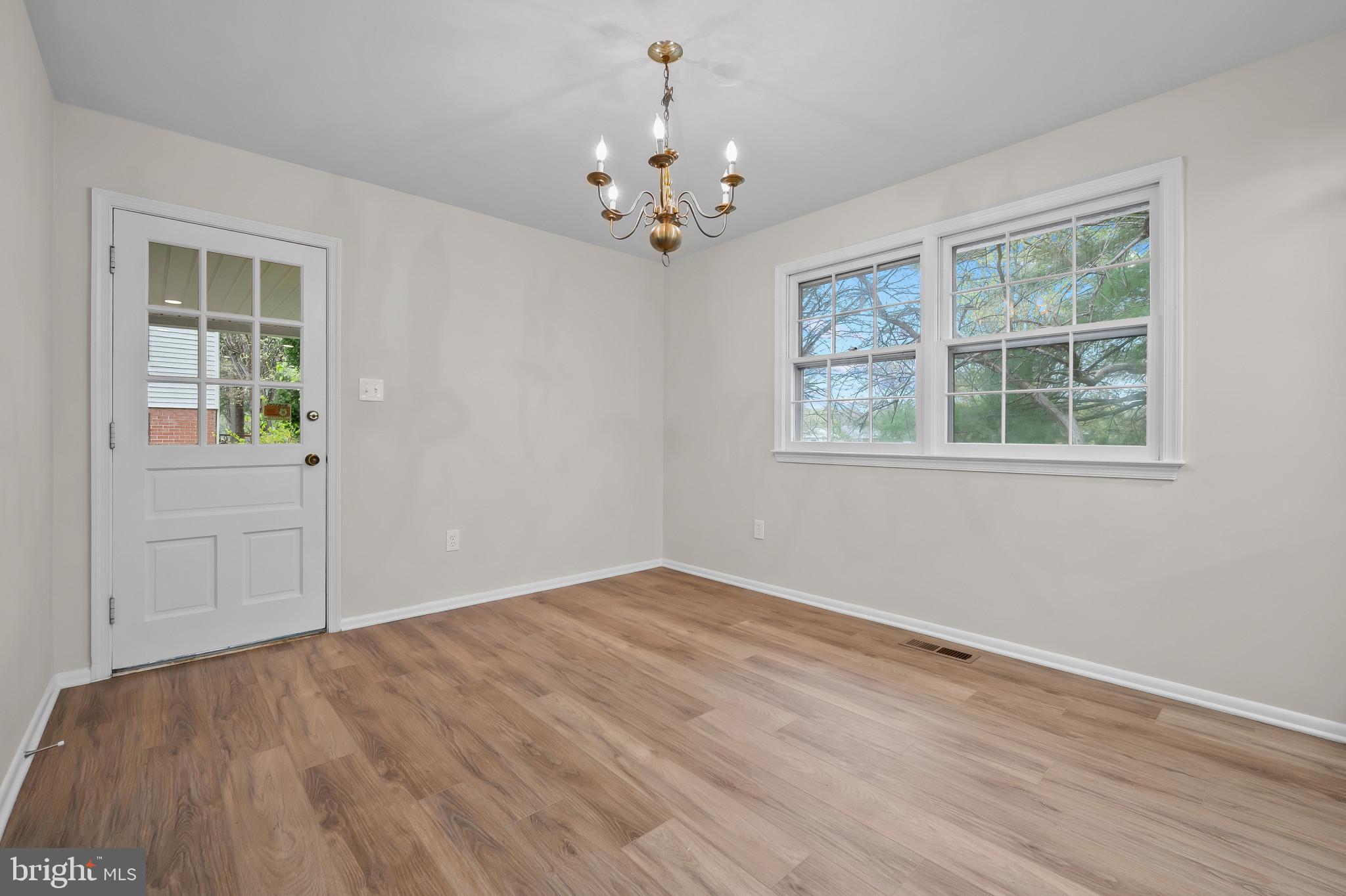 19420 Olney Mill Road Olney, MD 20832 - Photo 9 of 44 wooden floor in an empty room with a window