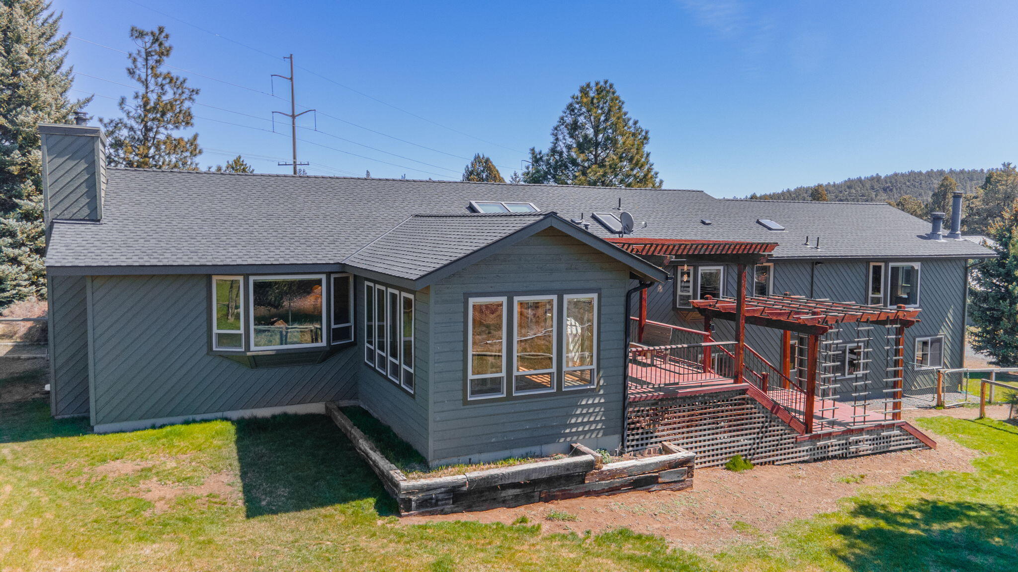 17375 Jordan Road Sisters, OR 97759 - Photo 11 of 63 West exterior with deck facing the mountains