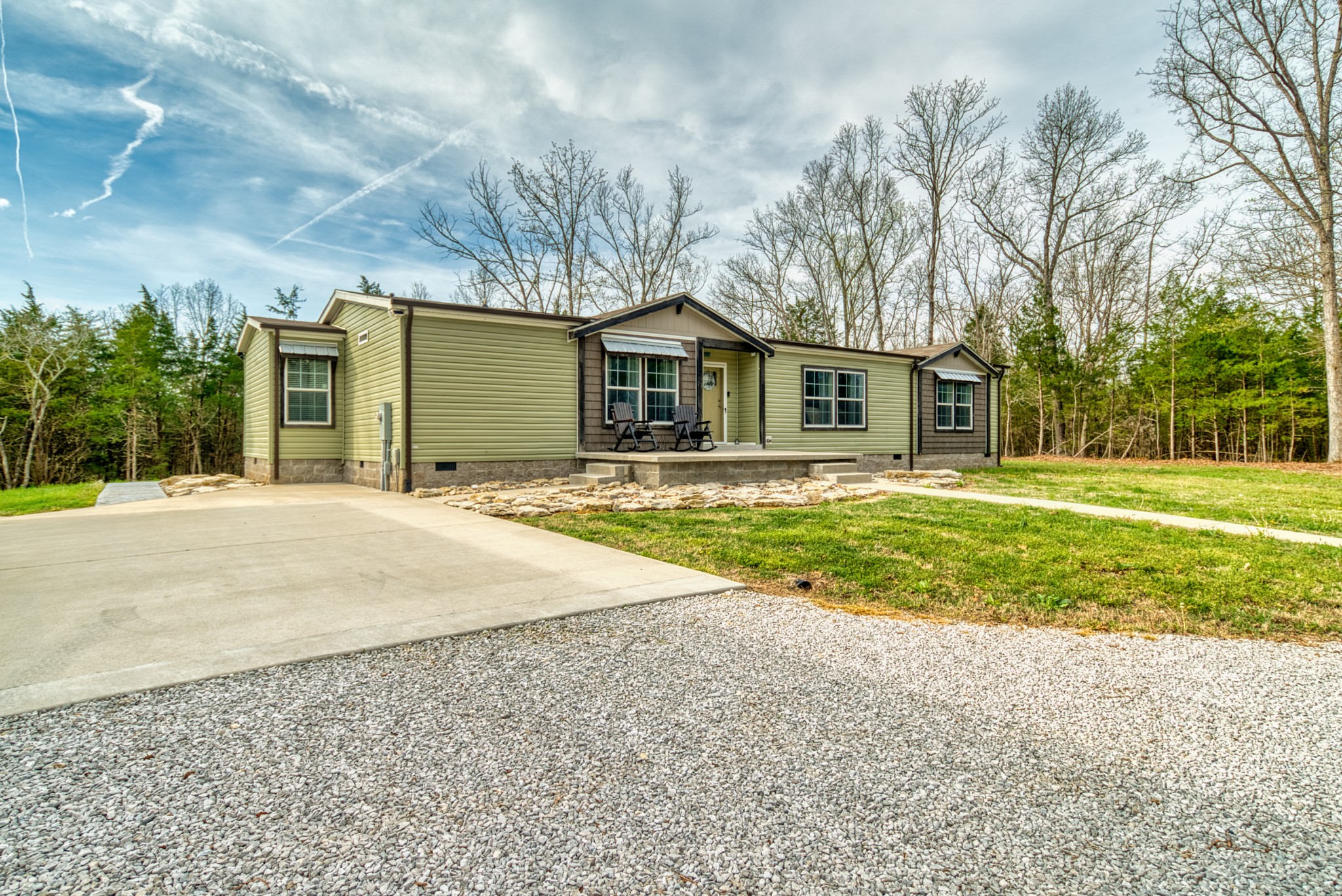 721 Spa Road Lewisburg, KY 42256 - Photo 11 of 56 a front view of a house with a yard and trees