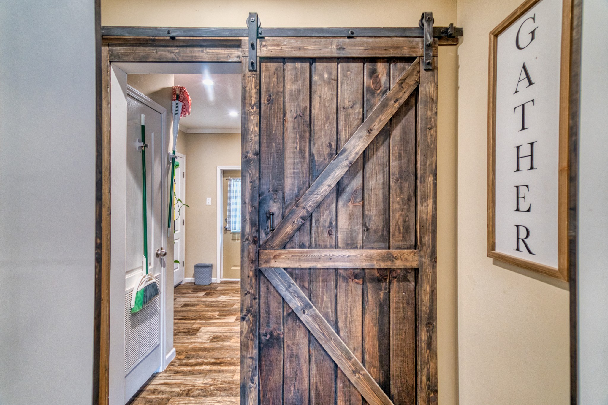721 Spa Road Lewisburg, KY 42256 - Photo 35 of 56 a view of a hallway with wooden floor and staircase