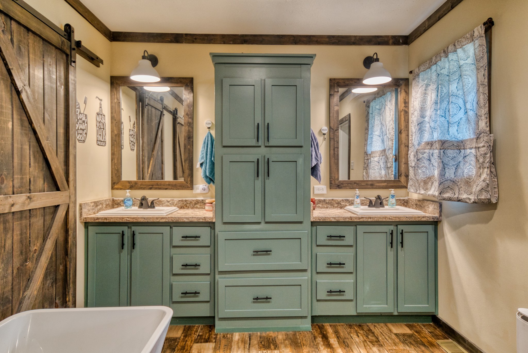 721 Spa Road Lewisburg, KY 42256 - Photo 39 of 56 a bathroom with a sink a mirror and a shower