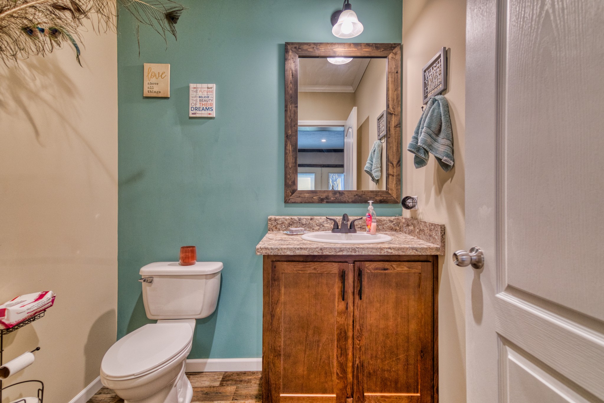 721 Spa Road Lewisburg, KY 42256 - Photo 46 of 56 a bathroom with a granite countertop toilet and a sink