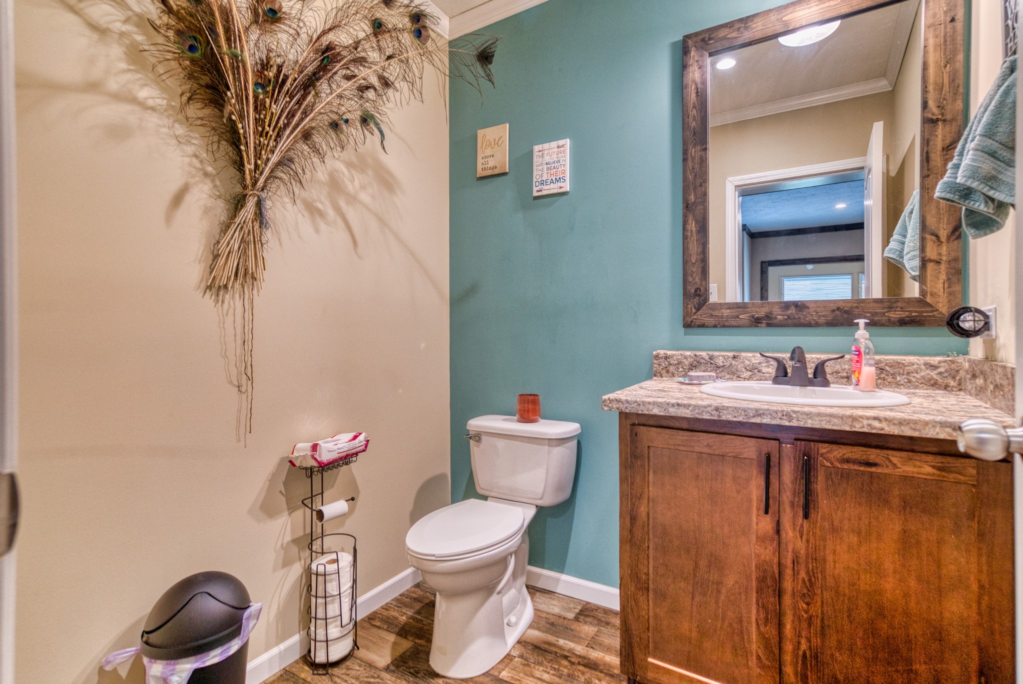 721 Spa Road Lewisburg, KY 42256 - Photo 47 of 56 a bathroom with a toilet sink and mirror