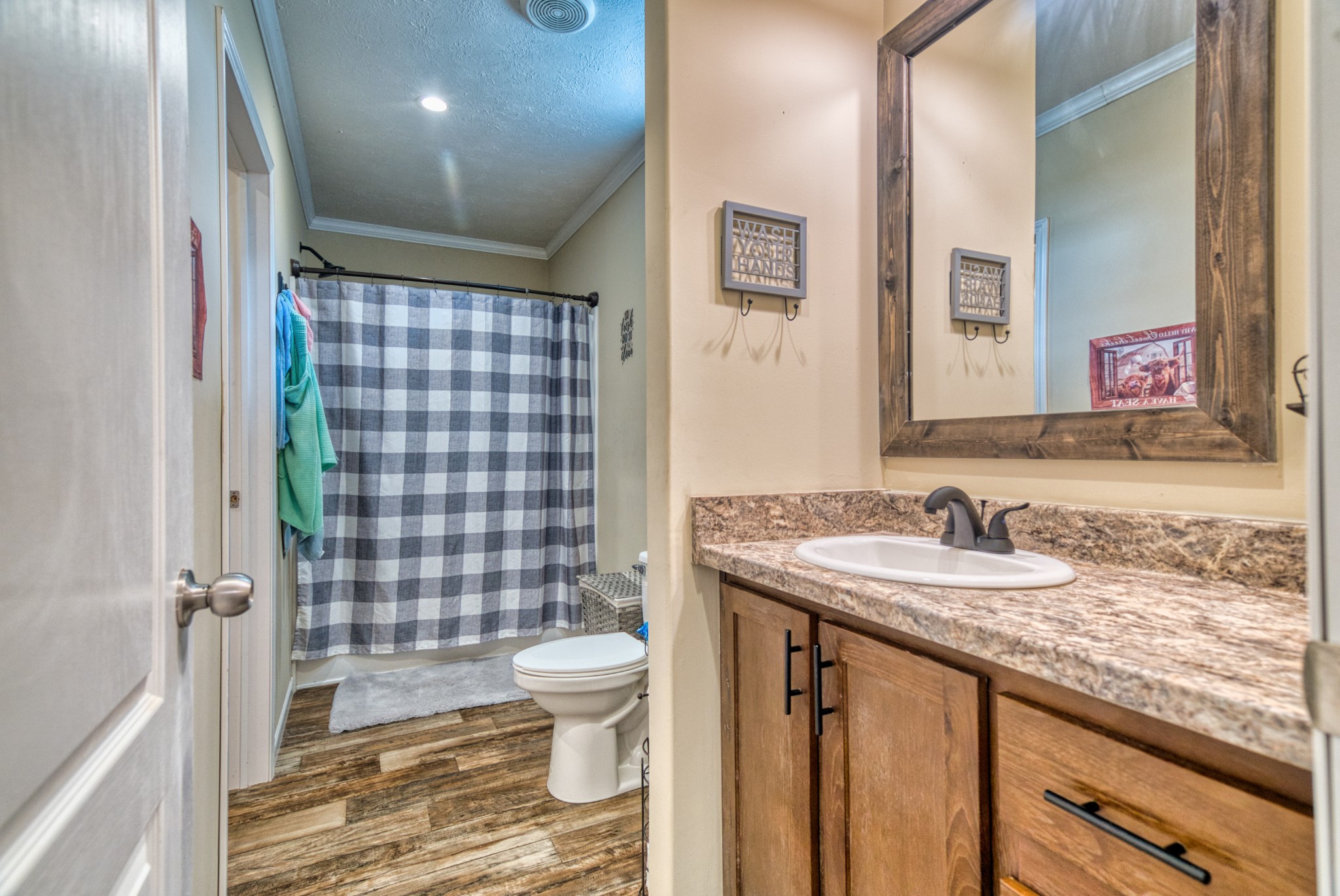 721 Spa Road Lewisburg, KY 42256 - Photo 52 of 56 a bathroom with a granite countertop sink toilet and shower