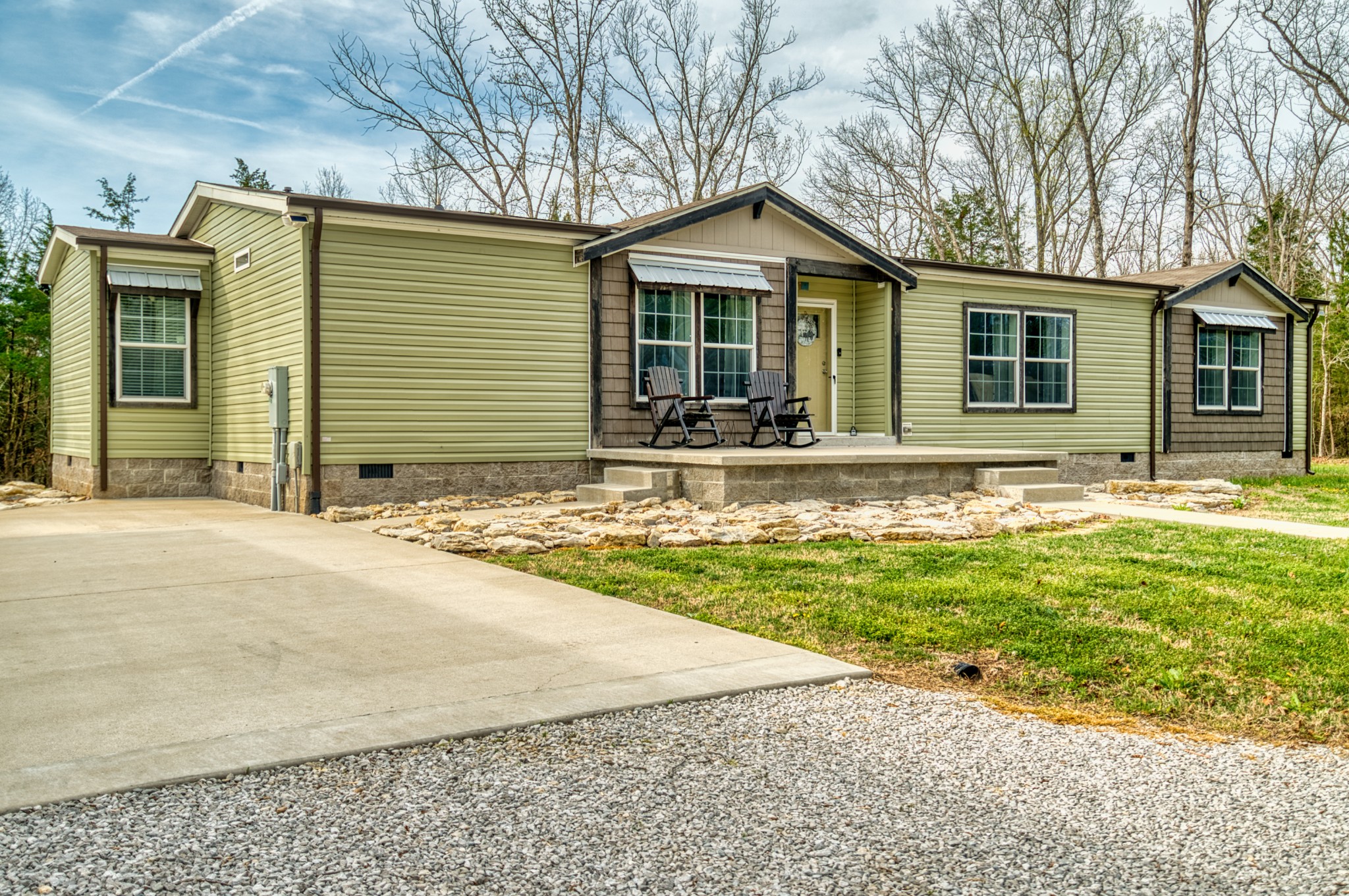 721 Spa Road Lewisburg, KY 42256 - Photo 6 of 56 a front view of a house with a yard and garage
