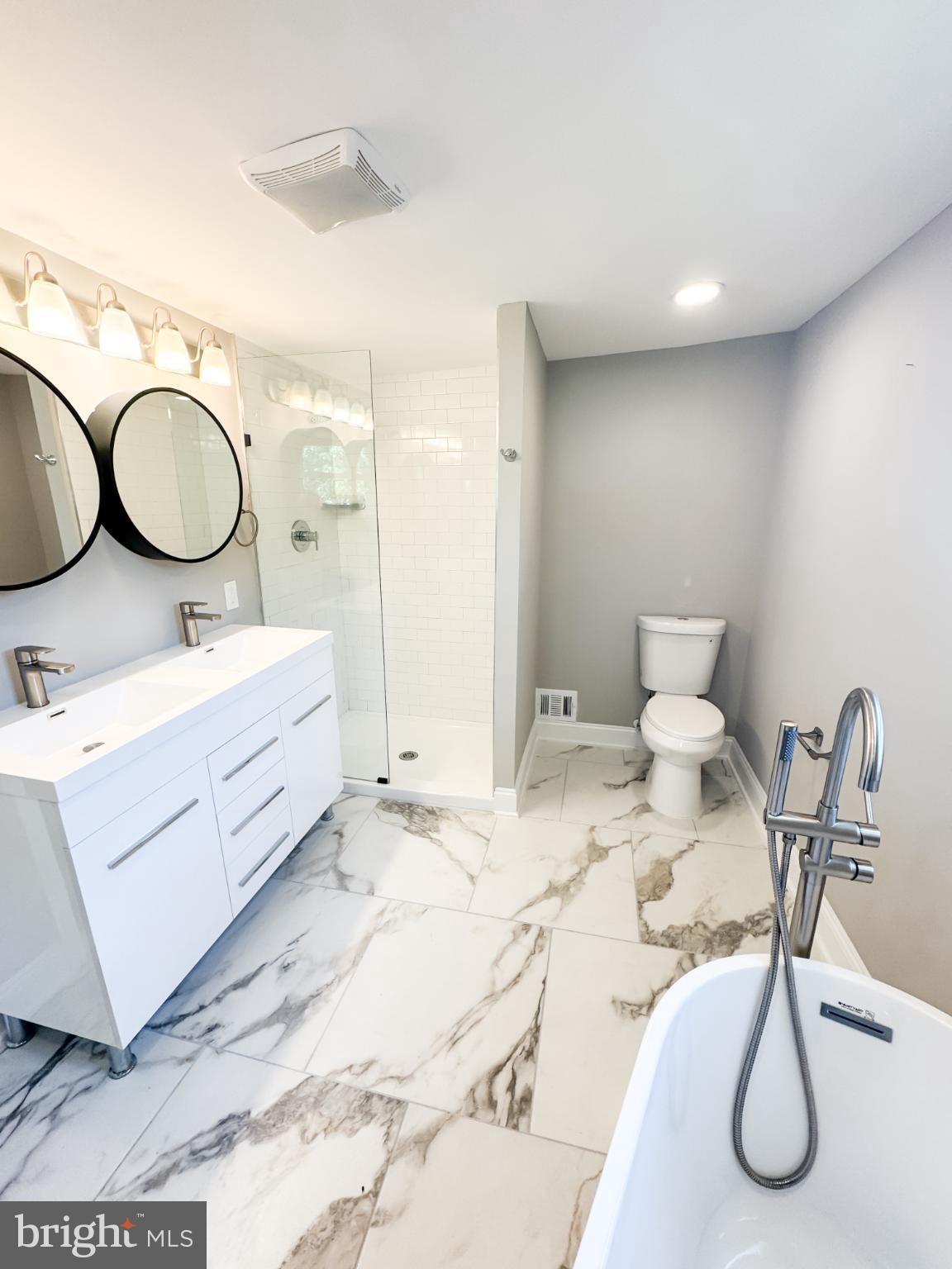 4105 30th Street Mount Rainier, MD 20712 - Photo 33 of 98 Sleek modern bathroom with elegant finishes.