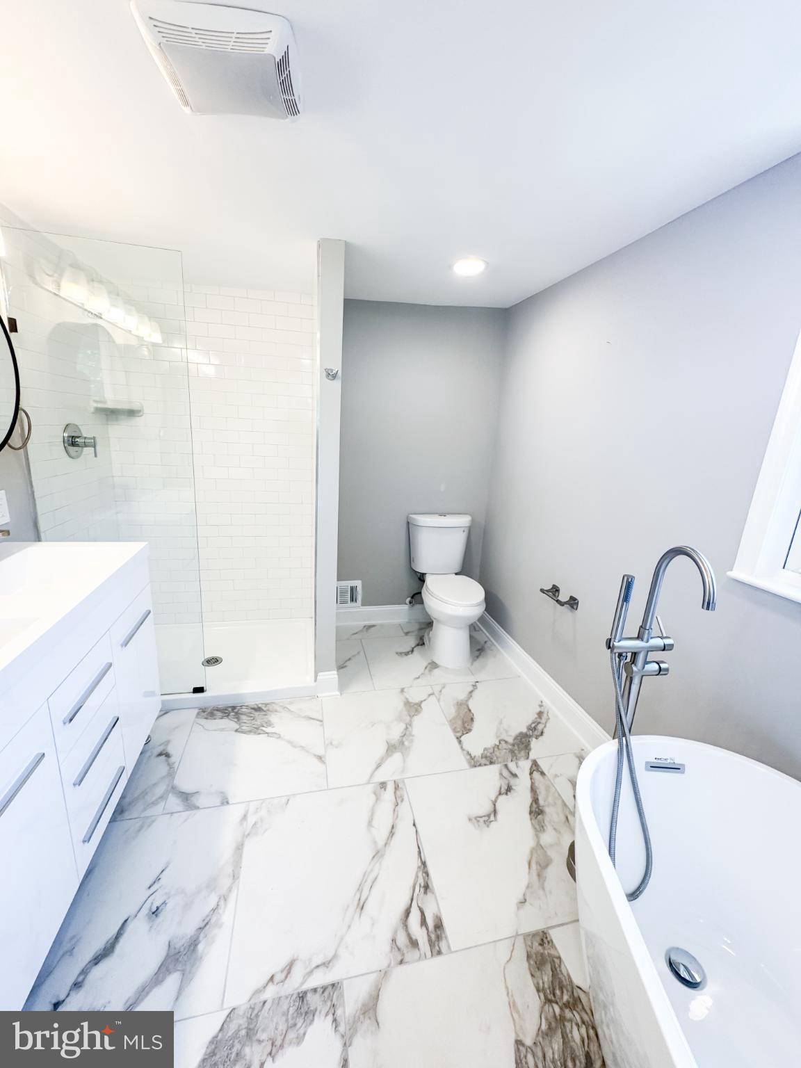 4105 30th Street Mount Rainier, MD 20712 - Photo 39 of 98 Sleek modern bathroom with elegant finishes.