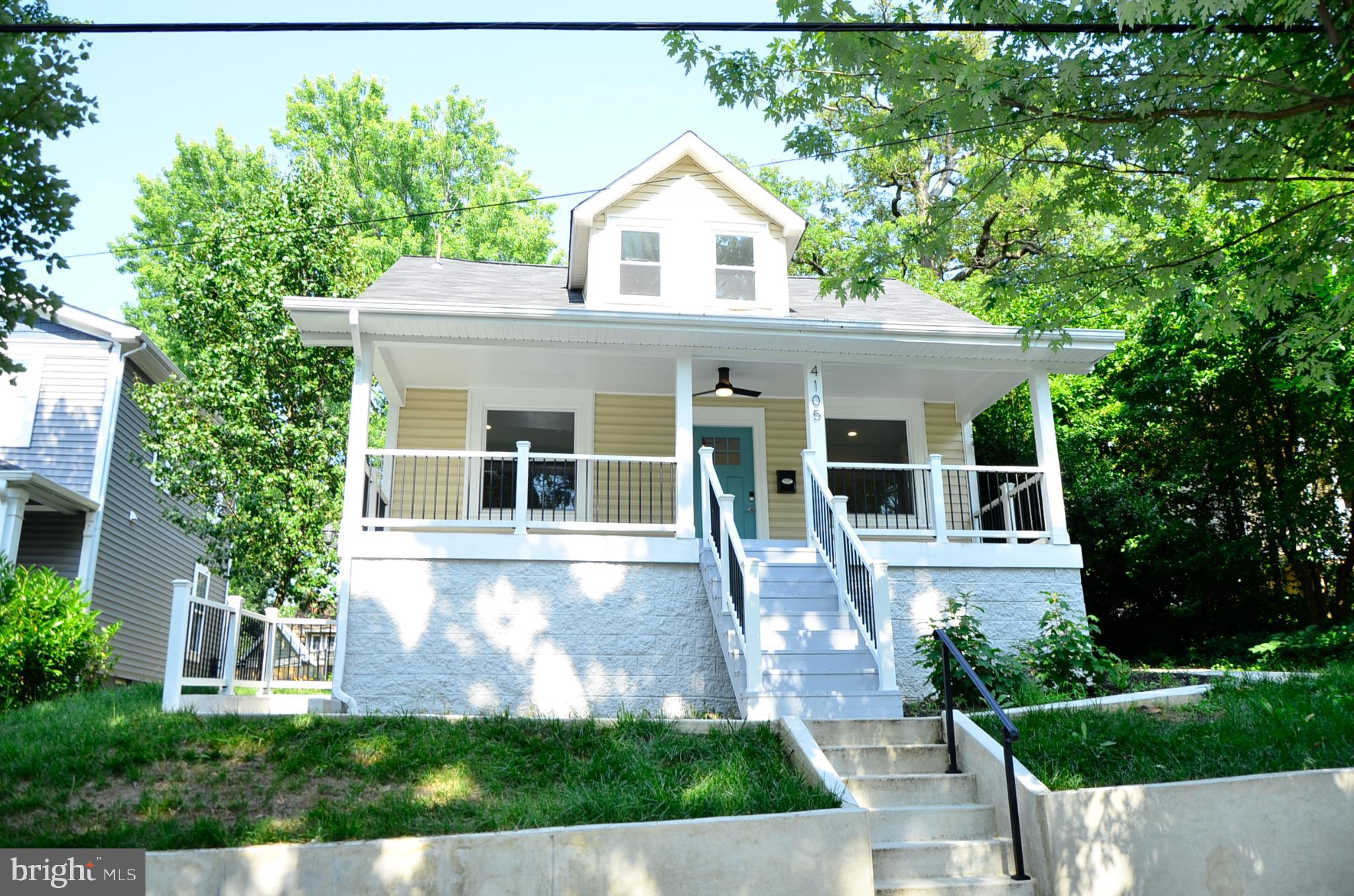 4105 30th Street Mount Rainier, MD 20712 - Photo 4 of 98 Charming home with inviting porch and greenery.